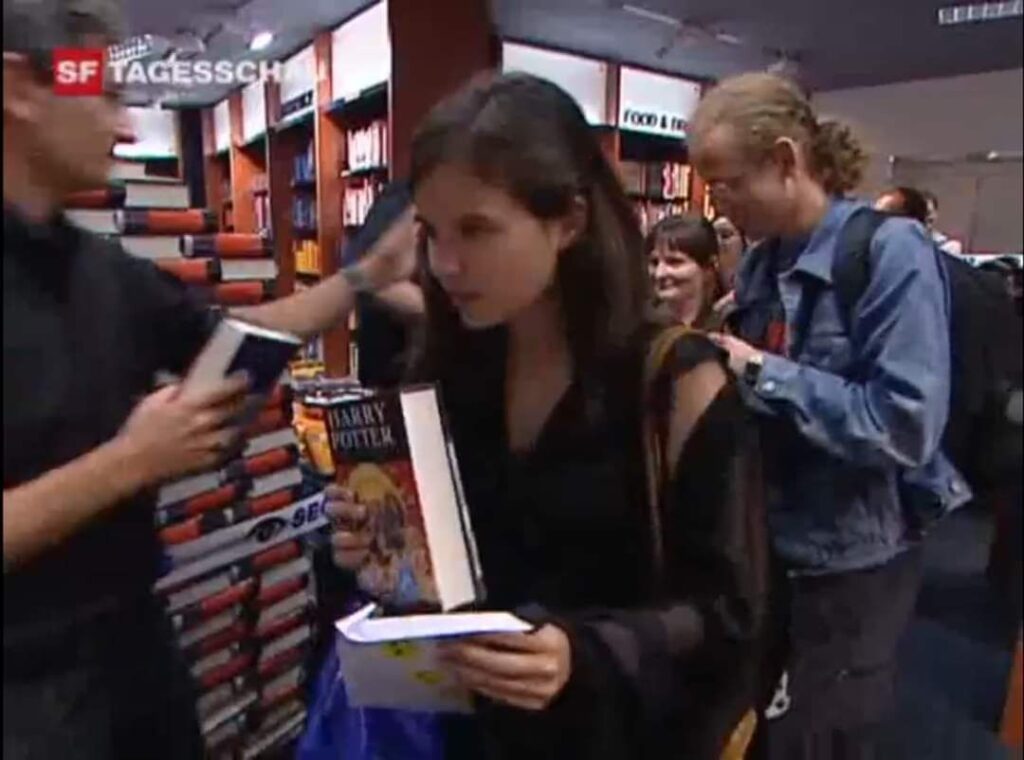 A much younger me standing in line with the last Harry Potter book